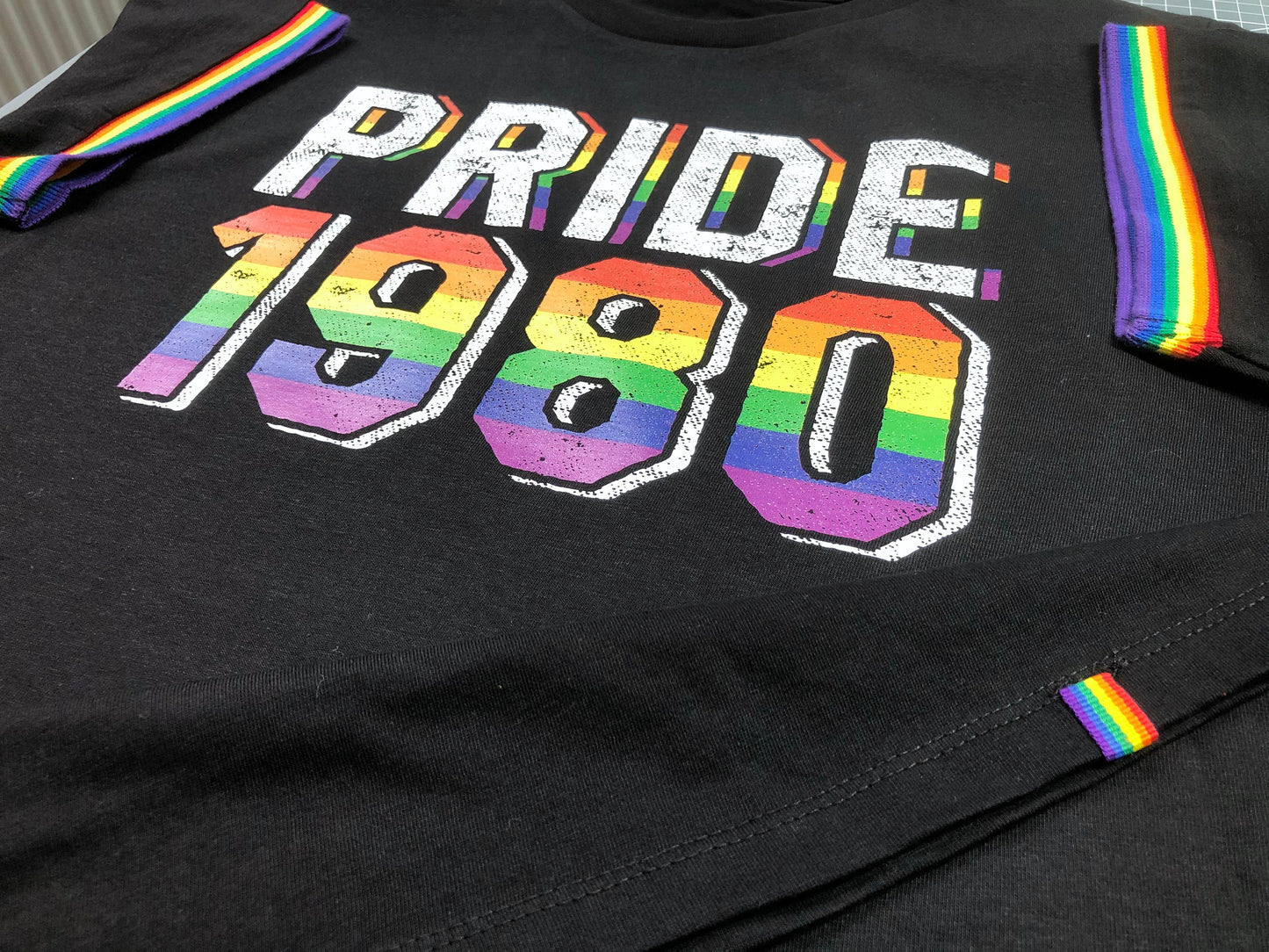 LGBTQ Gay Pride 1980 Birthday Year, Premium Unisex Rainbow Pride Stripe Sleeves and Stylish Hem Quirk