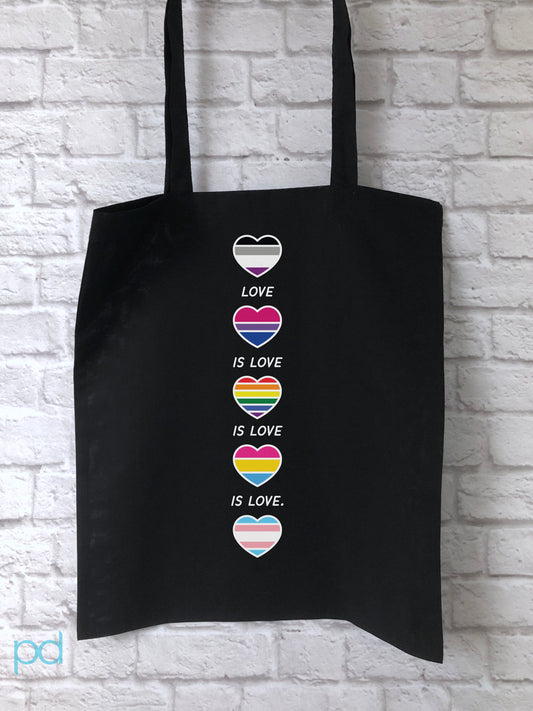 Love Is Love Is Love Tote Bag, Gay Pride Hearts Gift Idea, LGBTQ+ Flags in Hearts Organic Cotton Shopping Carrier